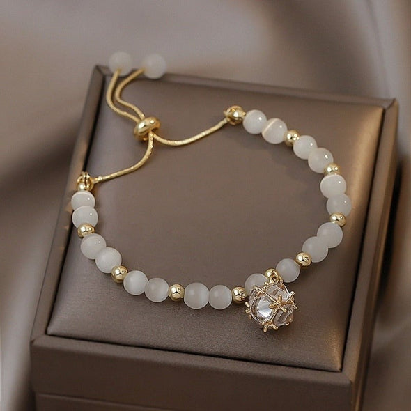 Opal and Gold Charm Bracelet