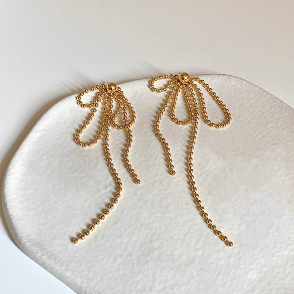 Gold Ribbon Drop Earrings